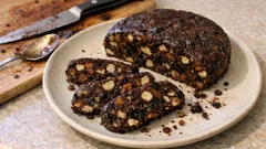 Panpepato (Italian Pepper Bread): a chewy holiday sweet with nuts, figs, and dark chocolate