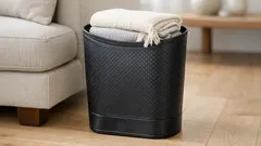 How to turn an old hot water bottle into a sleek blanket storage bin